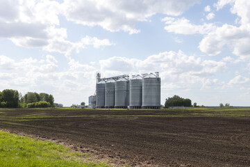 Modern silos for storing grain and cereals. Agricultural equipment.