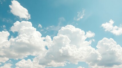 Naklejka premium Dreamy Blue A Gentle Sky Canvas Filled with Soft and Billowy White Clouds Under the Brightness of a Day Filled with Hope