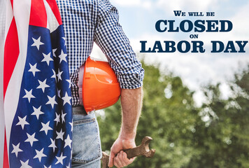 Signboard with the inscription We will be closed on Labor Day. Congratulations for family, loved...