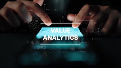 Hands Interacting with Touchscreen Device Displaying Value Analytics in a High-Tech Environment. Asymptotic smart data analytic.