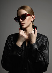 Beautiful young woman in sunglasses