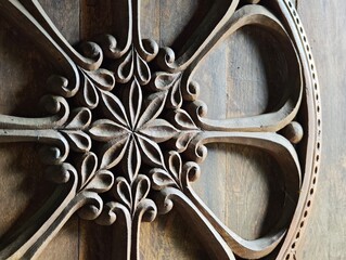 Intricate floral wood carving decorating a wooden surface