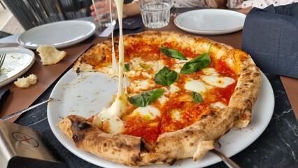 pizza pitsa hot fresh cheese and basilico