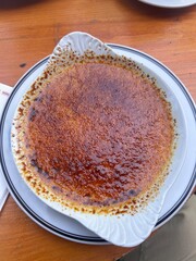 Creme brulee dessert served at restaurant traditional french dessert