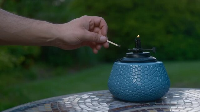 Lighting a bug repellent flame