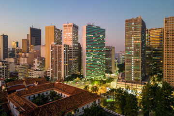 Skyline of Rio de Janeiro City Downtown With Office Buildings in the Evening and Carioca Square Below