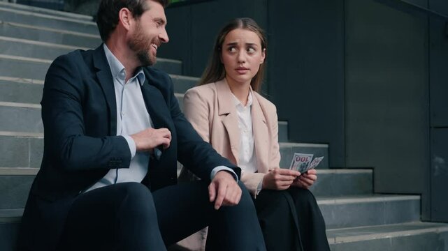 Two business man and woman in city counting money cash happy smile rich male and sad frustrated female businessman with businesswoman gender inequality financial unequal discrimination sexism at work