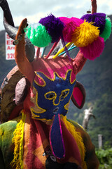 Vibrant Cucurucho Costume with Shiny Decorations – Buesaco Festival, Nariño, Colombia