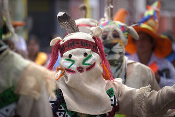 Cucurucho Character with Red Headband in Traditional Parade – Buesaco, Nariño Festival