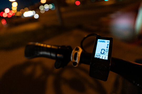 Close-up of electric bike handlebar with mini-computer