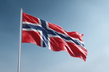 Norwegian flag waves in the wind on clear day. National pride, patriotism, government, political symbol, country identity.