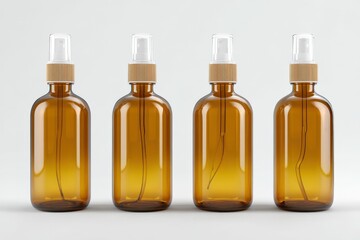 Four amber glass bottles stand in a row. Product mockup, cosmetic packaging, spray bottles, minimalist style, spa product