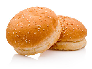 Two hamburger buns with sesame isolated on white background