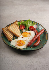 Poached Eggs with Sausages and Turkish Bread