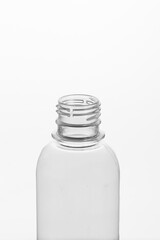 close-up of the neck of a plastic bottle on a white background