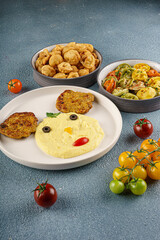 Creative Kids Meal with Mashed Potatoes, Cutlets and Sides