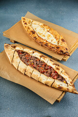 Traditional Turkish Pide with Minced Meat Filling, Closeup