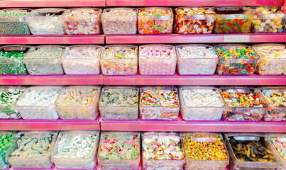 A wide variety of jelly candies on the counter.