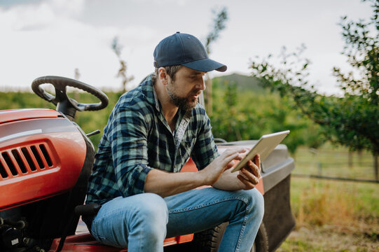 Digital agriculture tools help farmer manage orchard.