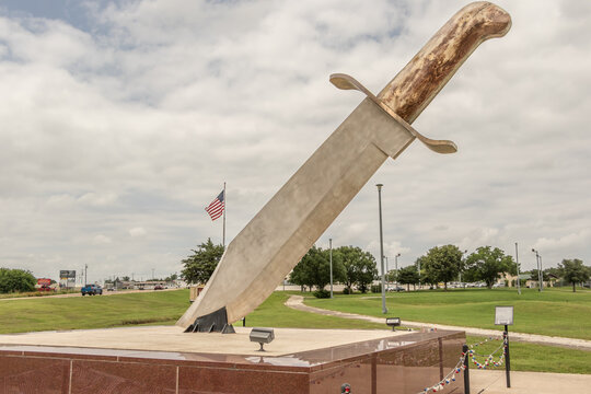 Statue of the largest Bowie Knife in the world located in Bowie, Texas. It is made of steel, brass and wood and is in the Guinness Book of World records 