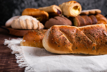 Artisan Herb-Crusted Bread on Rustic Wood