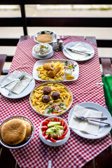 Traditional lunch on a mountain restaurant terrace