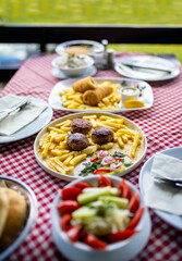 Traditional lunch on a mountain restaurant terrace