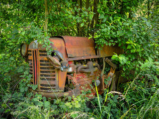 old rusty and broken tractor