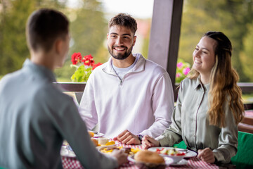 Sibling bonding over a meal in nature