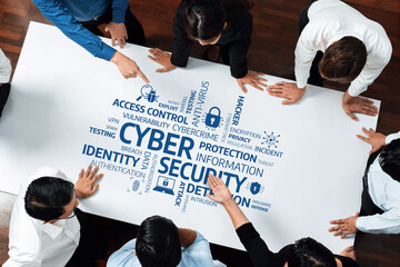 A diverse team engages in a cybersecurity strategy meeting, analyzing crucial terms and concepts...