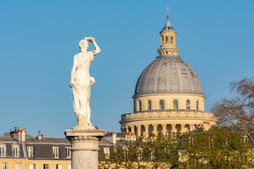 Sculpture in Luxembourg gardens and Pantheon dome in Latin quarter, Paris, France