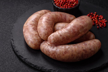 Raw meat sausages made from beef or pork, fresh meat for barbecuing or grilling. Raw sausages
