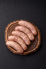 Raw meat sausages made from beef or pork, fresh meat for barbecuing or grilling. Raw sausages