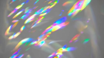 Dreamy holographic rainbow light refraction texture overlay with abstract soft bokeh effect on a white wall. Organic prismatic glow and natural shadows - Powered by Adobe