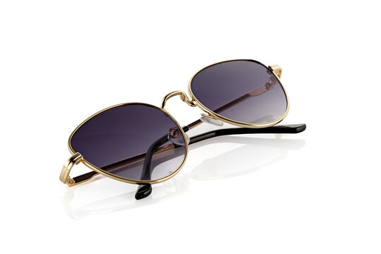 Women sunglasses isolated on white background. Sunglasses summer women fashion accessories. Modern metal glasses.