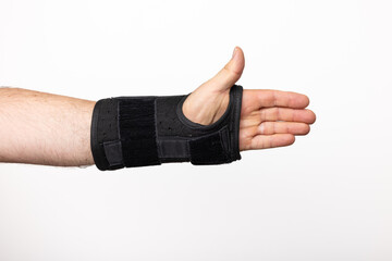 A Wrist Brace For Carpal Tunnel On A Man's Hand