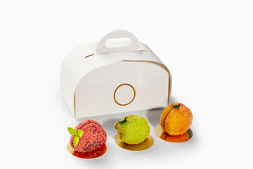 Pastry chef creating fruit shaped desserts with take away box