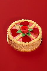 Delicious cake decorated with rose and hearts for braun family