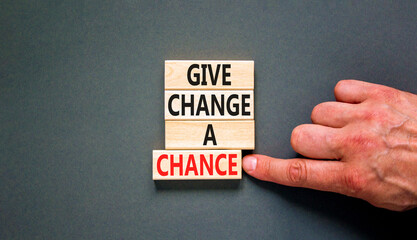 Give change a chance symbol. Concept words phrase Give change a chance on beautiful wooden blocks....
