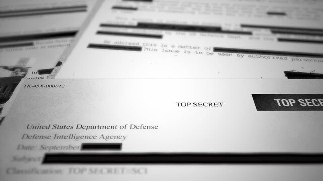 Camera moves across various top secret paper and documents with official stamps. Close up on government agency classified looking reports. Sensitive surveillance information leaked by spy mole insider