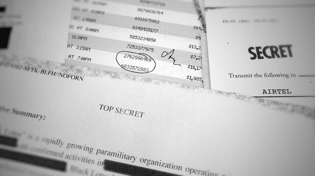 Spin around classified documents with official top secret stamp or label. Close up on various government agency report papers. Photocopy and censored information. Conspiracy corruption and espionage