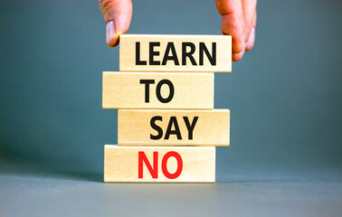 Learn to say no symbol. Concept words phrase Learn to say no on beautiful wooden blocks. Beautiful...
