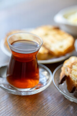 turkish cup of tea with breakfast teapot	
