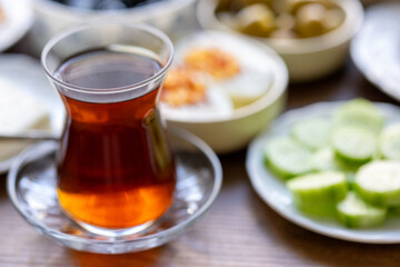 Turkish style breakfast: eggs, chechil cheese, white cheese, kashar cheese and Turkish tea