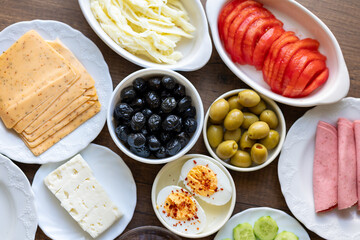 Turkish style breakfast: eggs, chechil cheese, white cheese, kashar cheese and Turkish tea