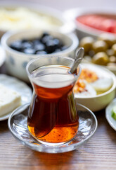 turkish cup of tea with breakfast teapot	