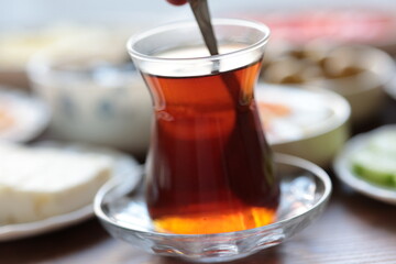 turkish cup of tea with breakfast teapot	