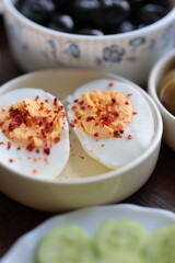 Close-up of a spiced boiled egg cut in half, Turkish breakfast style cultural