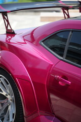Classic Cherry Red Coupe – Side Profile