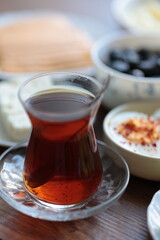 Turkish style breakfast: eggs, chechil cheese, white cheese, kashar cheese and Turkish tea